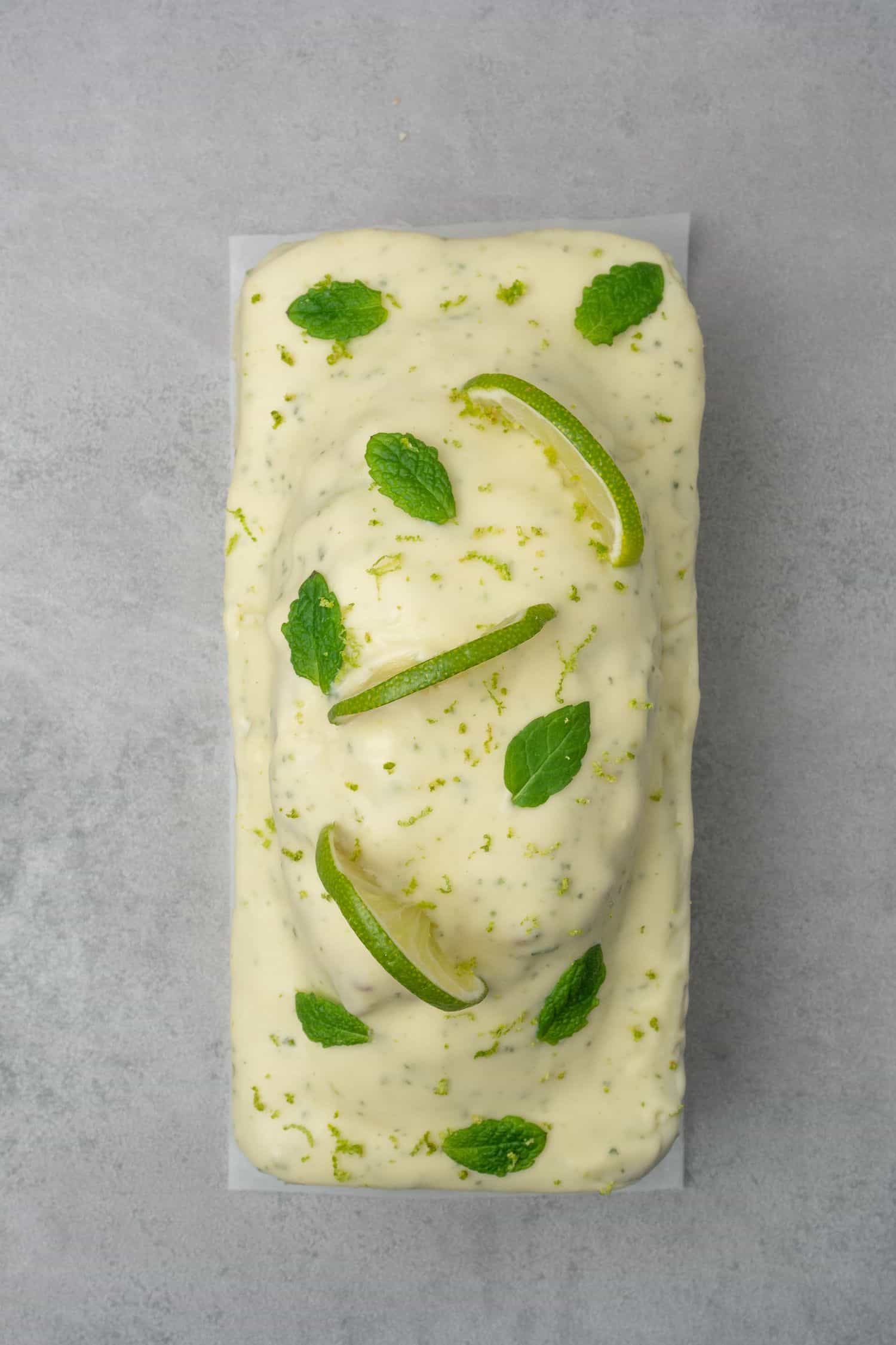 Mojito Pound Cake decorated with mint and lime. 
