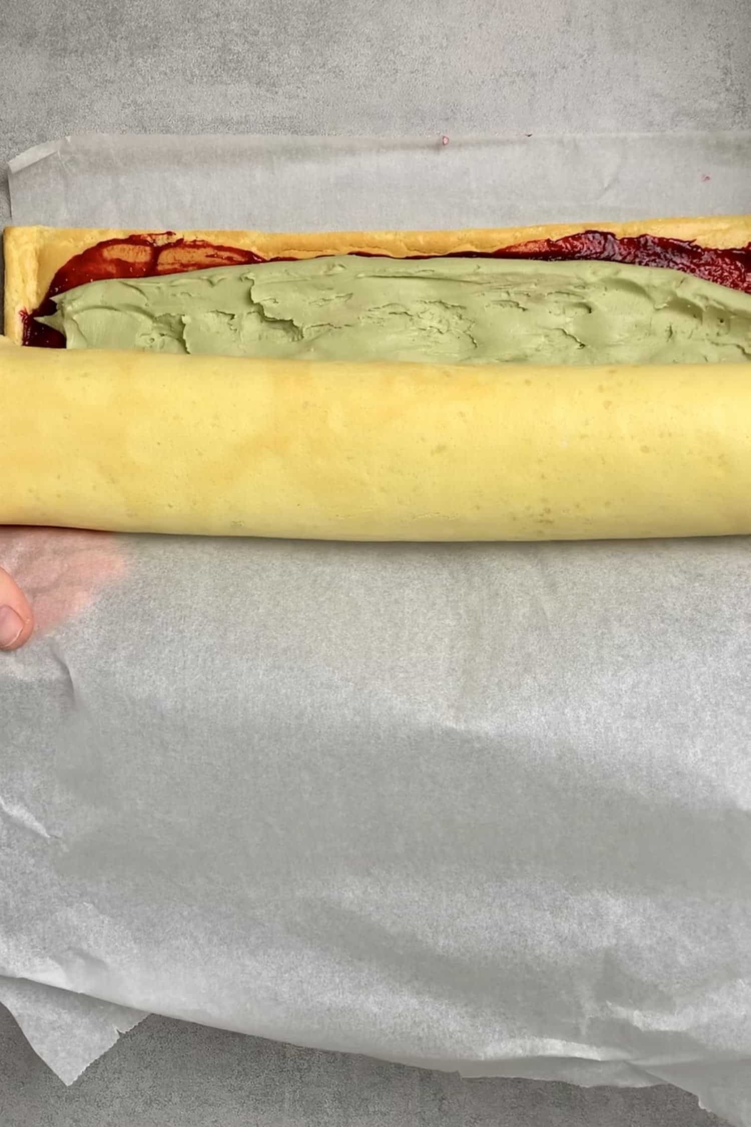 Rolling up the cake roll.