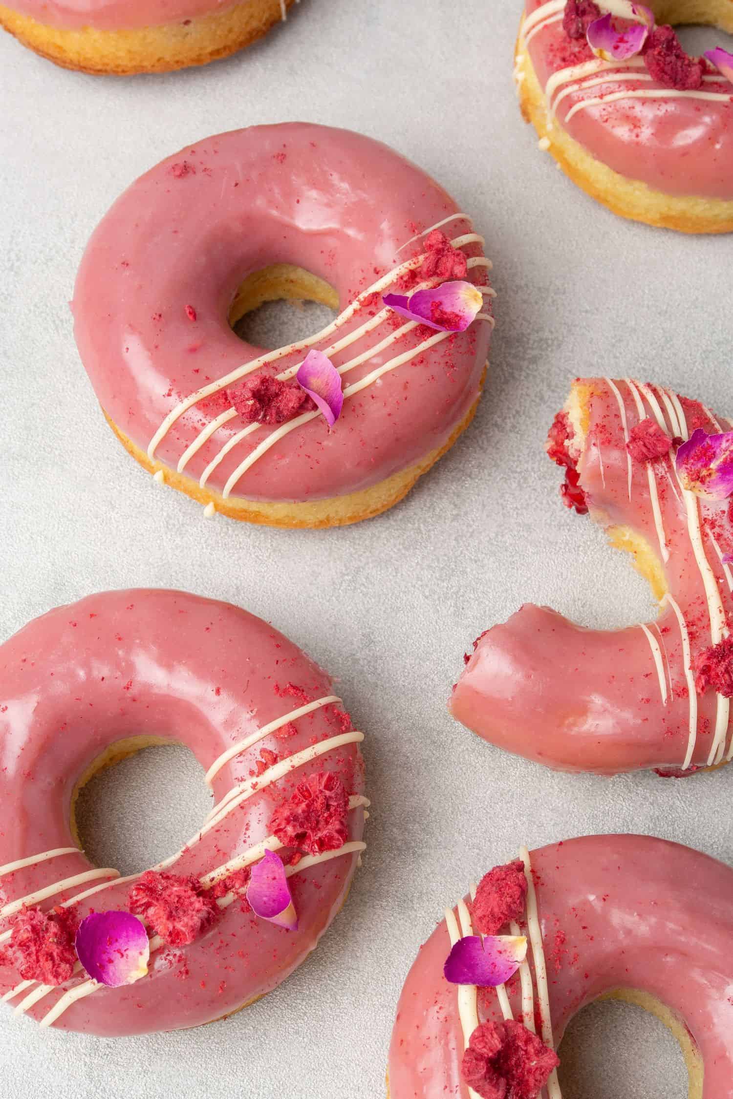 Baked donuts with raspberry and rosewater