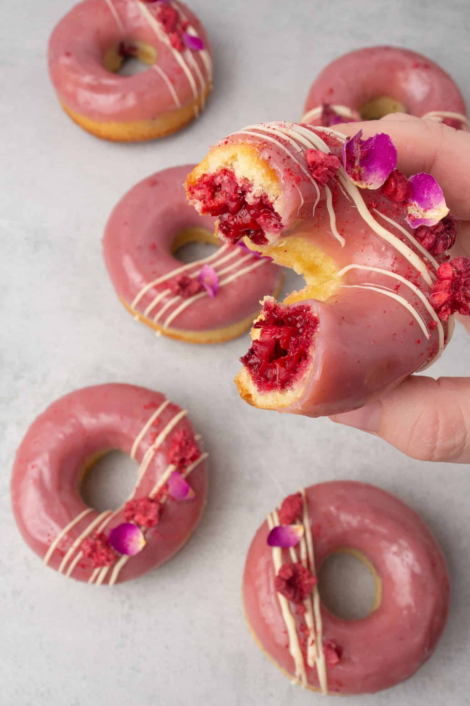 Baked donuts with raspberry and rosewater.