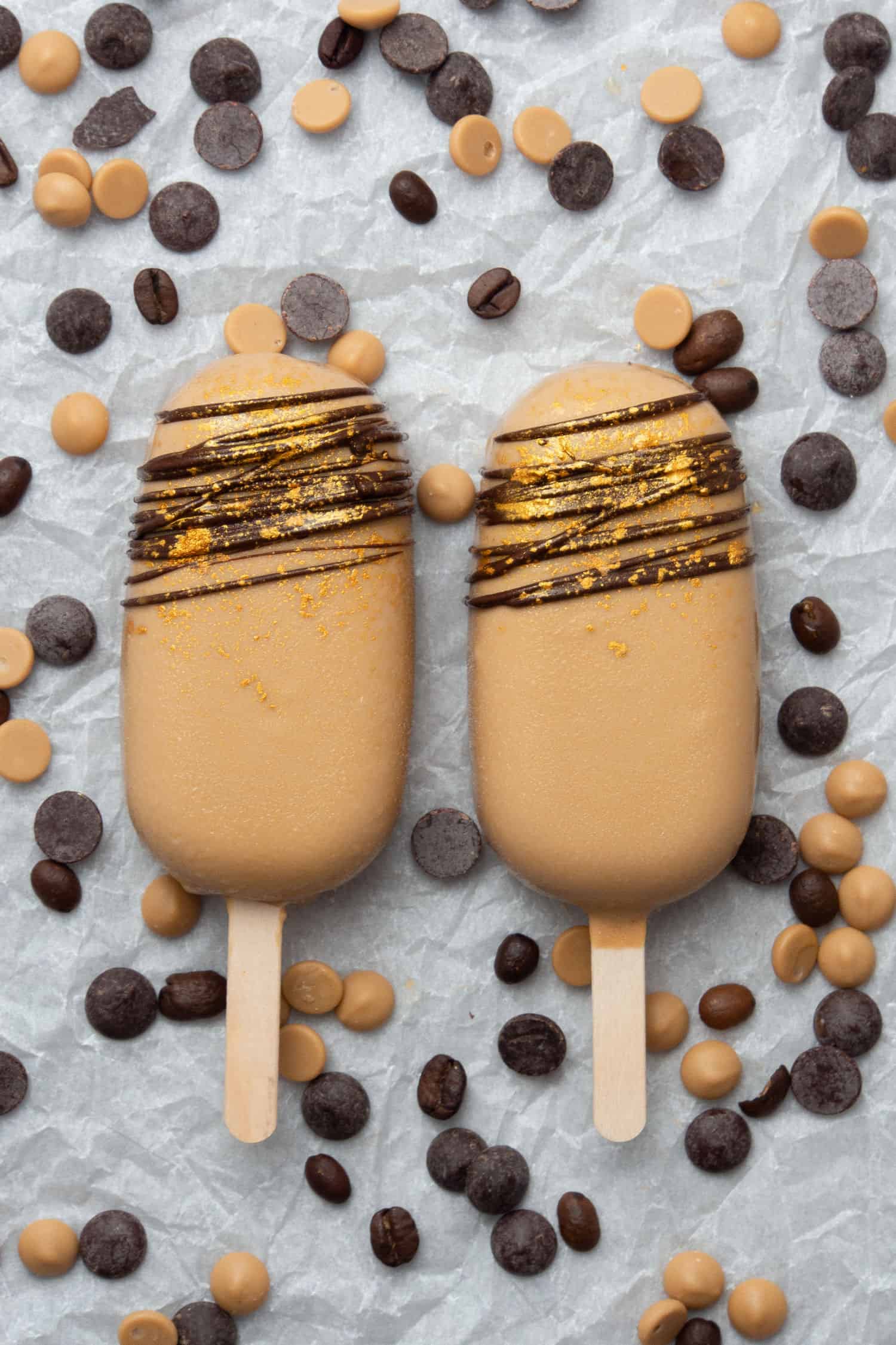 2 pcs of Coffee caramel ice cream bar on a white baking paper.