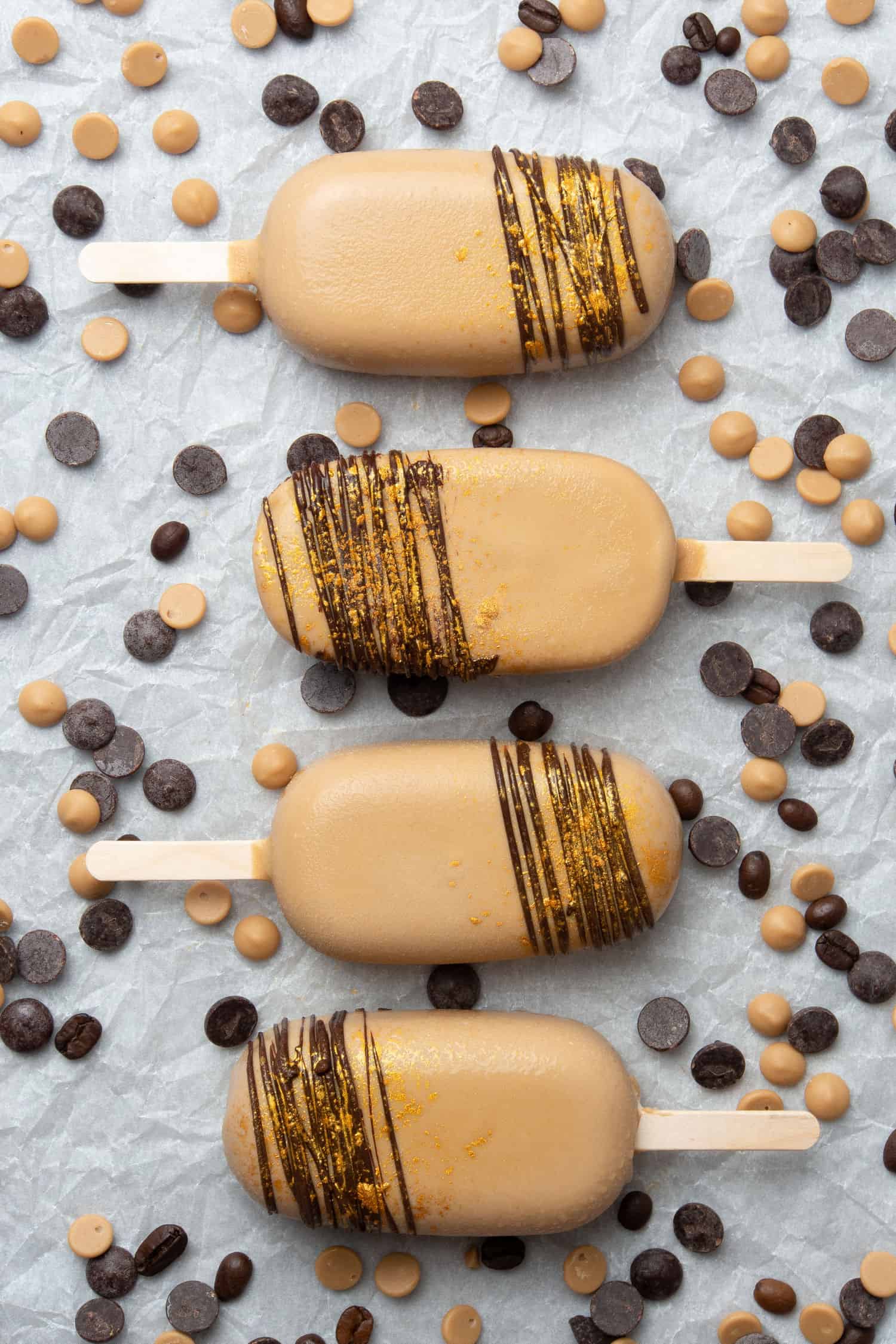 4 pcs of Coffee caramel ice cream bar on a white baking sheet.