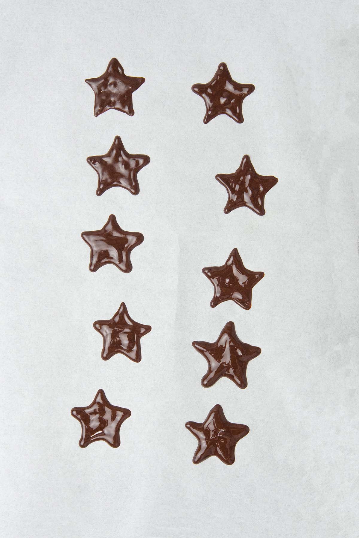 Star shaped chocolate decoration on a baking paper
