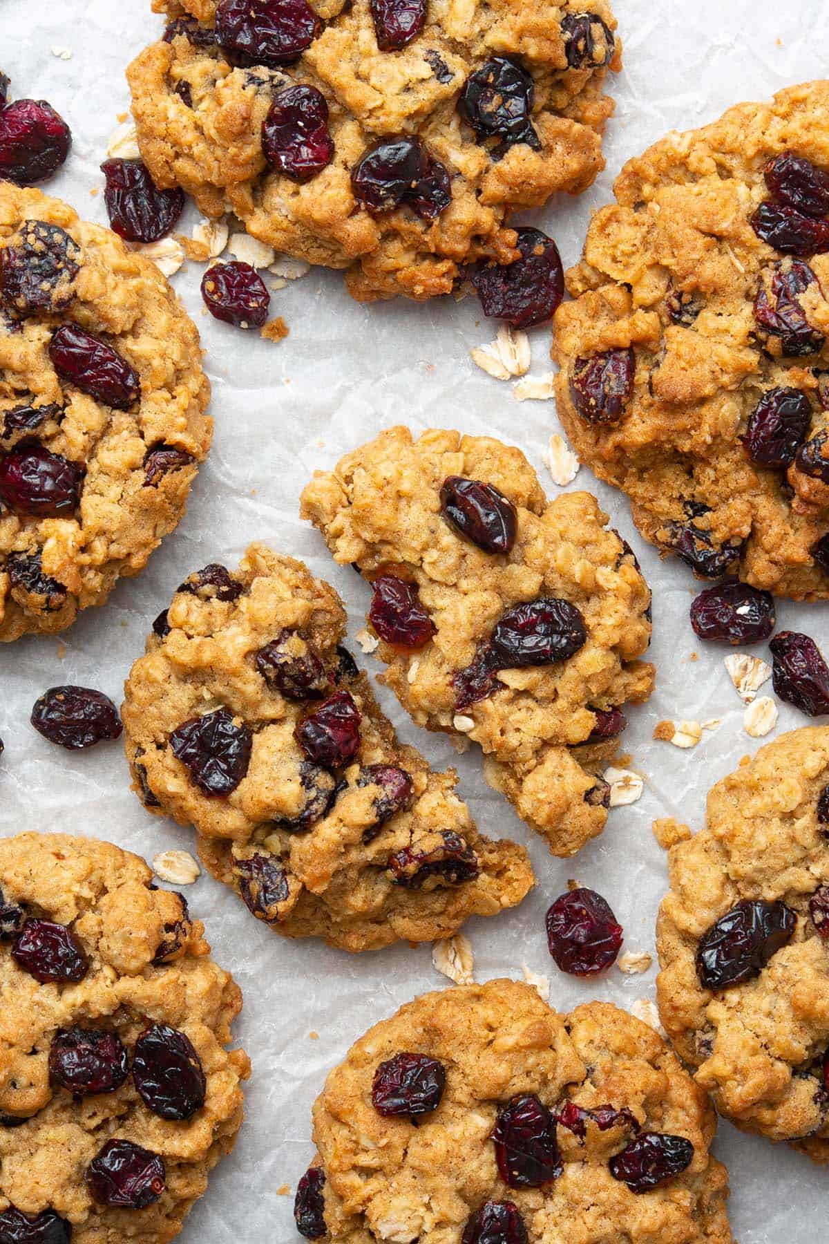 a few Oatmeal craisin cookies on a white paper 