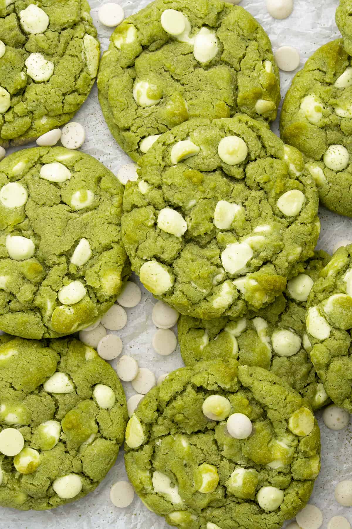 Dozen of Matcha cookies on a white paper.