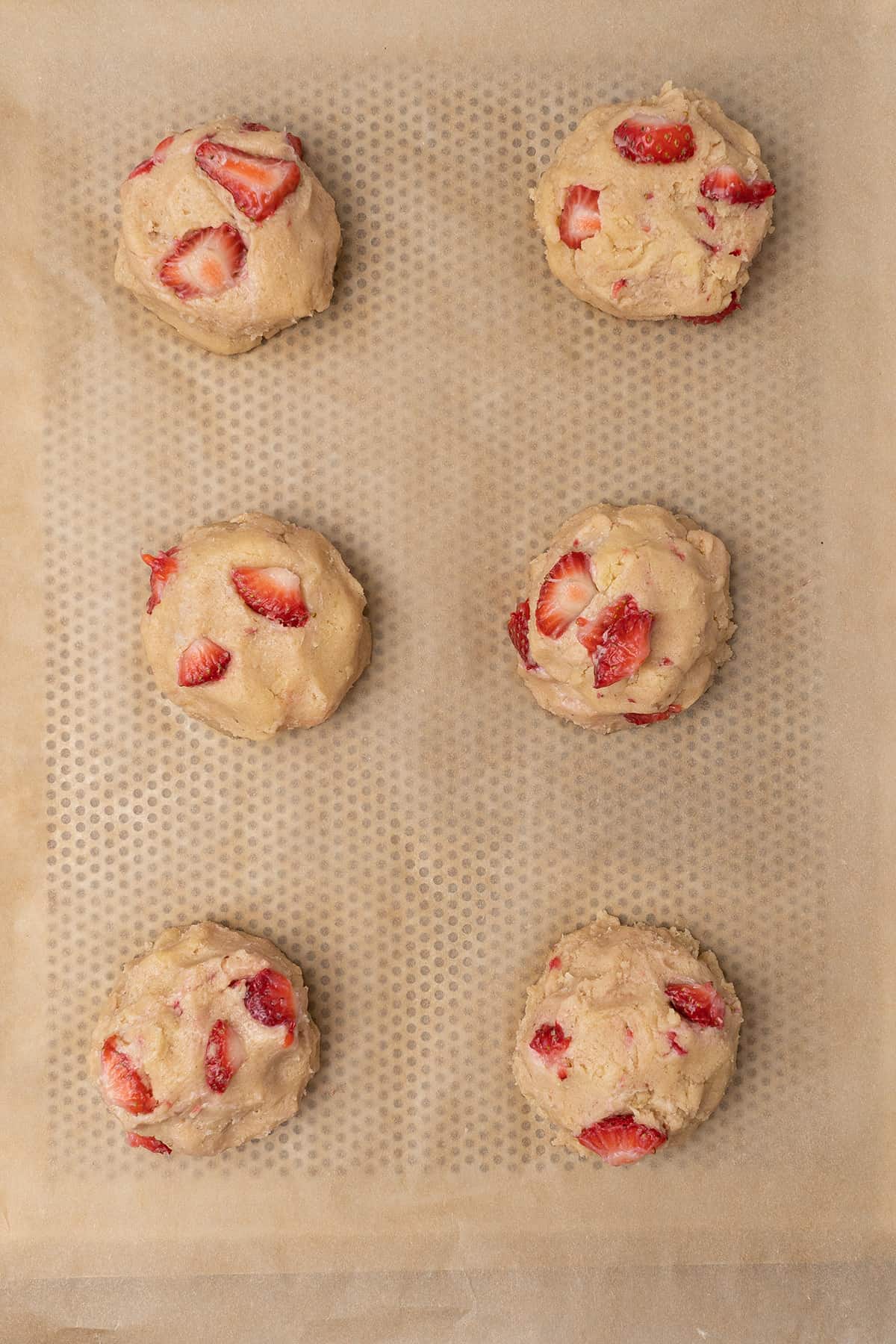 6 Strawberry cheesecake cookie balls after assembling, before baking