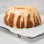 Cardamom cake on a cooling rack.