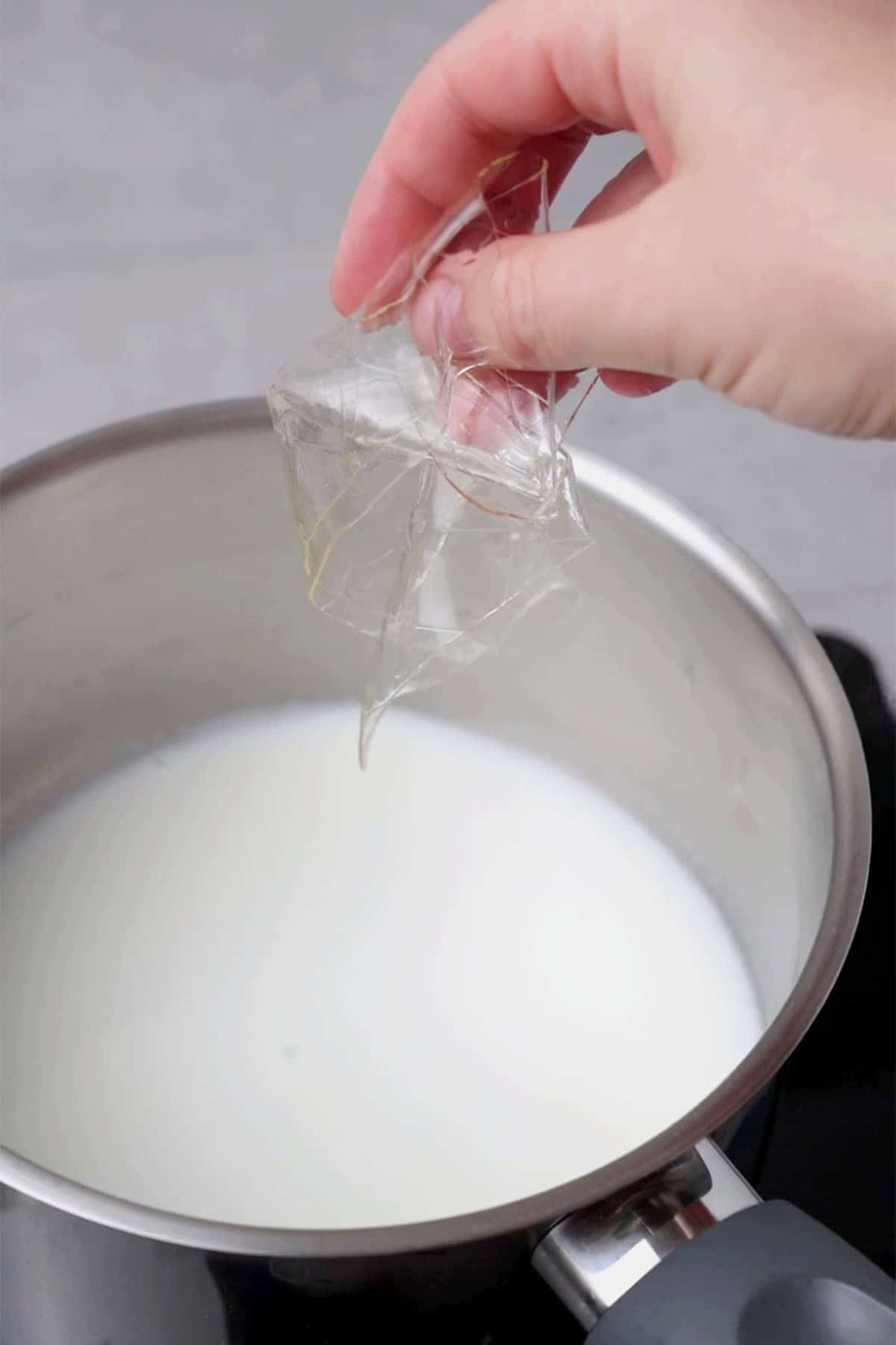 Soak gelatin sheets in milk.