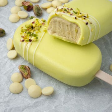 2 Pistachio ice cream bar on top of each others.