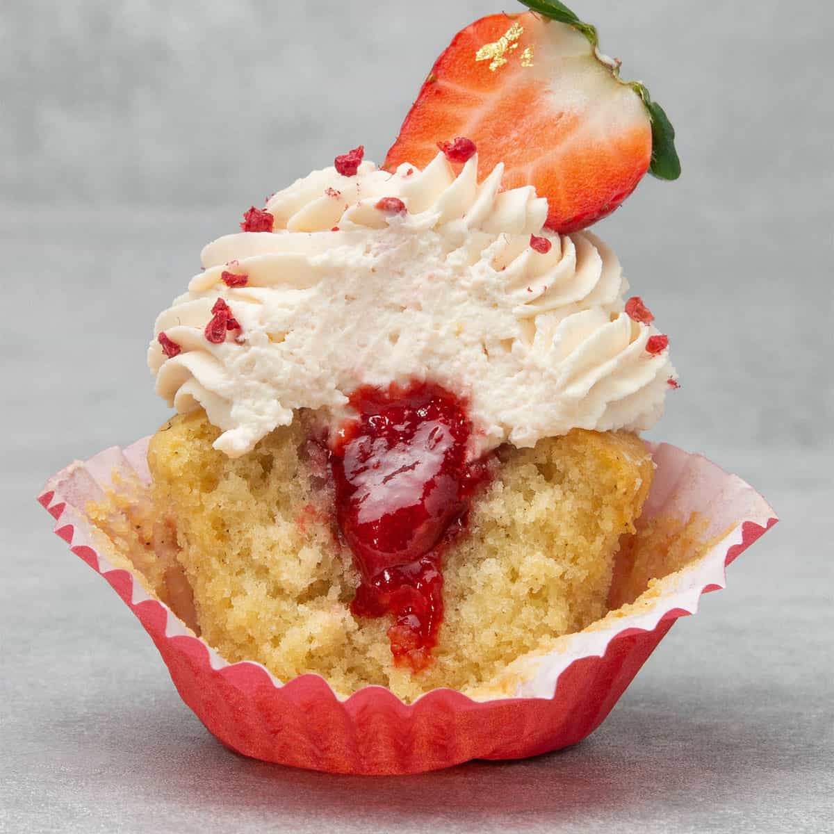 a half Strawberry filled cupcake.