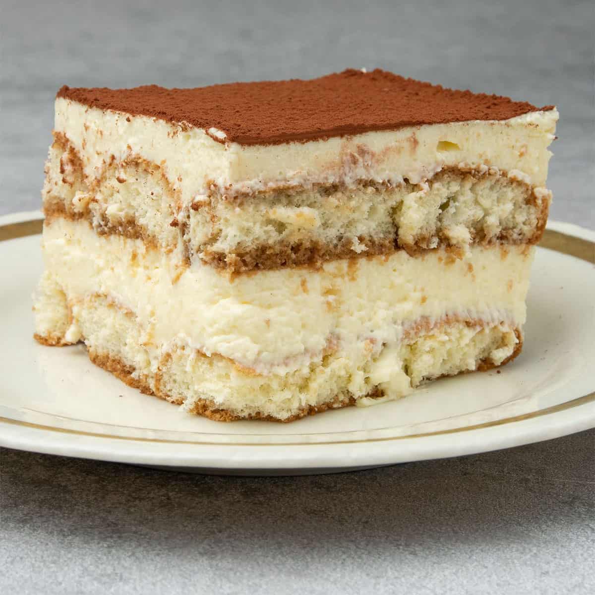 A slice of tiramisu on a plate.