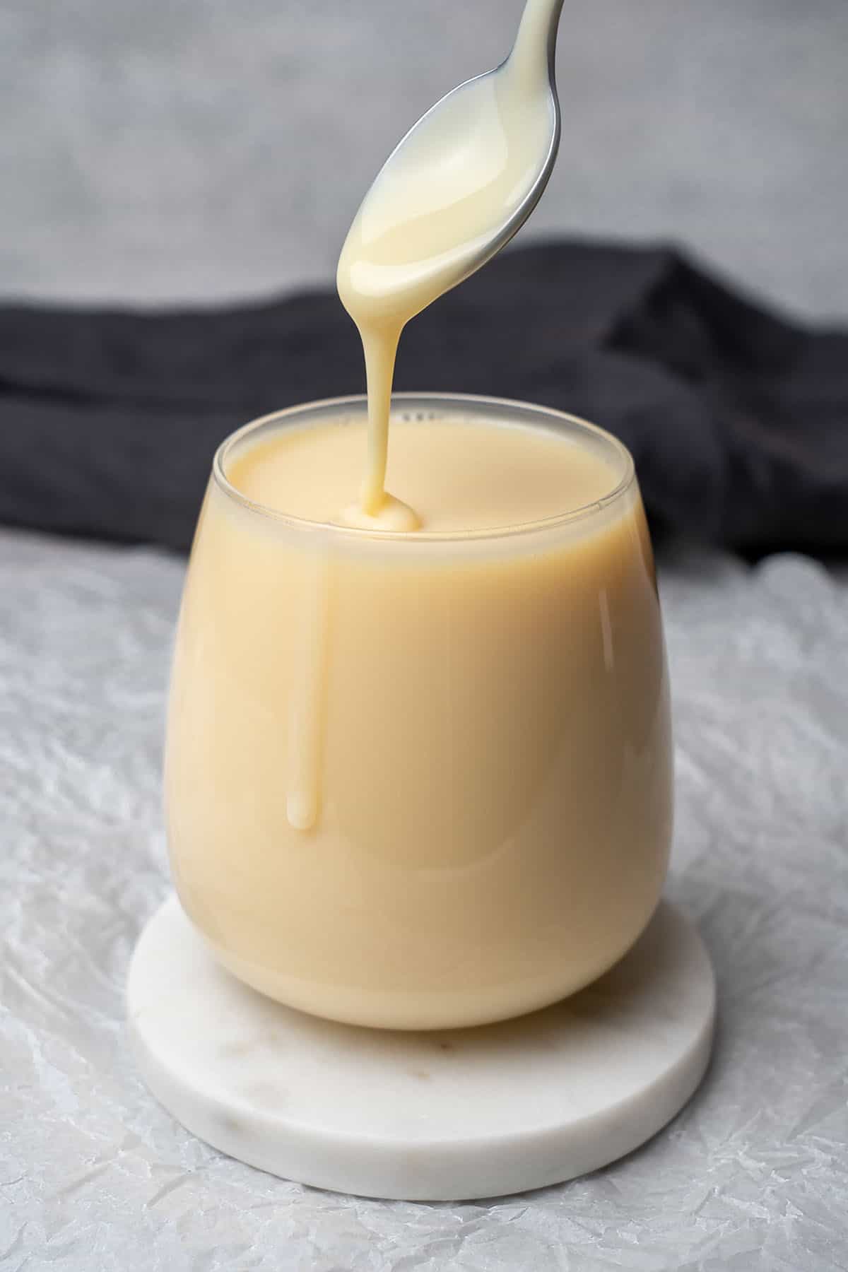 sweetened condensed milk in a glass.