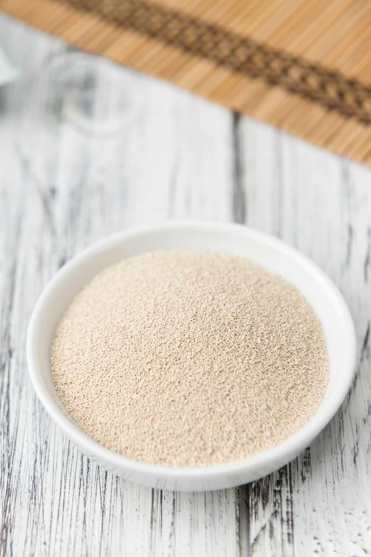 Dry yeast in a small bowl.