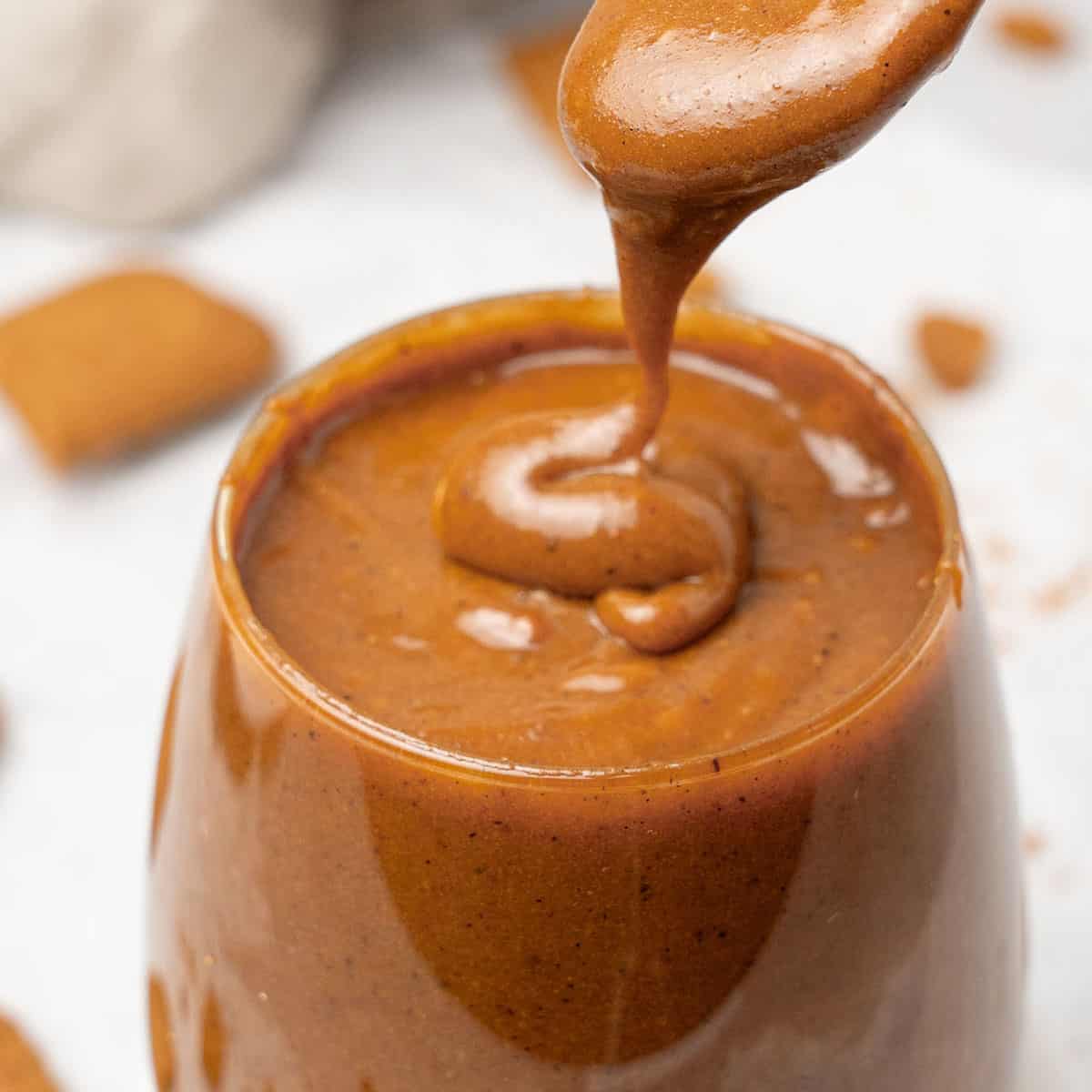 Biscoff spread in a glass.