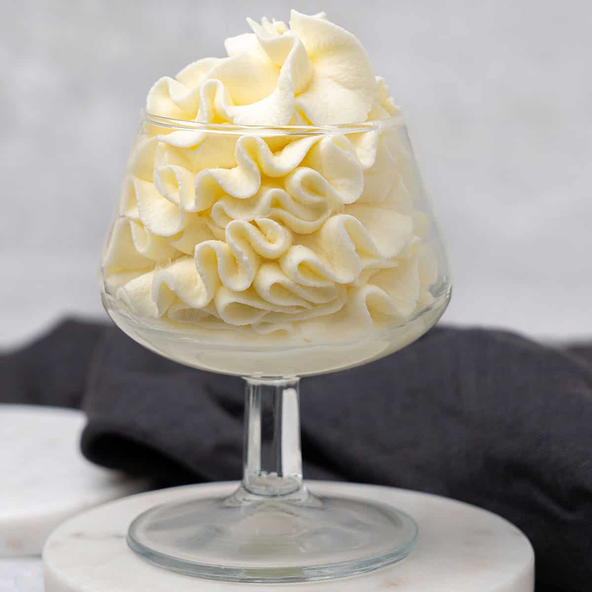 Mascarpone frosting in a glass.