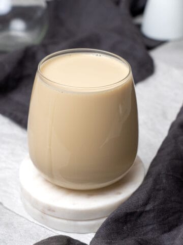 Evaporated milk in a glass.