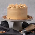 Hazelnut cake on a cake stand.