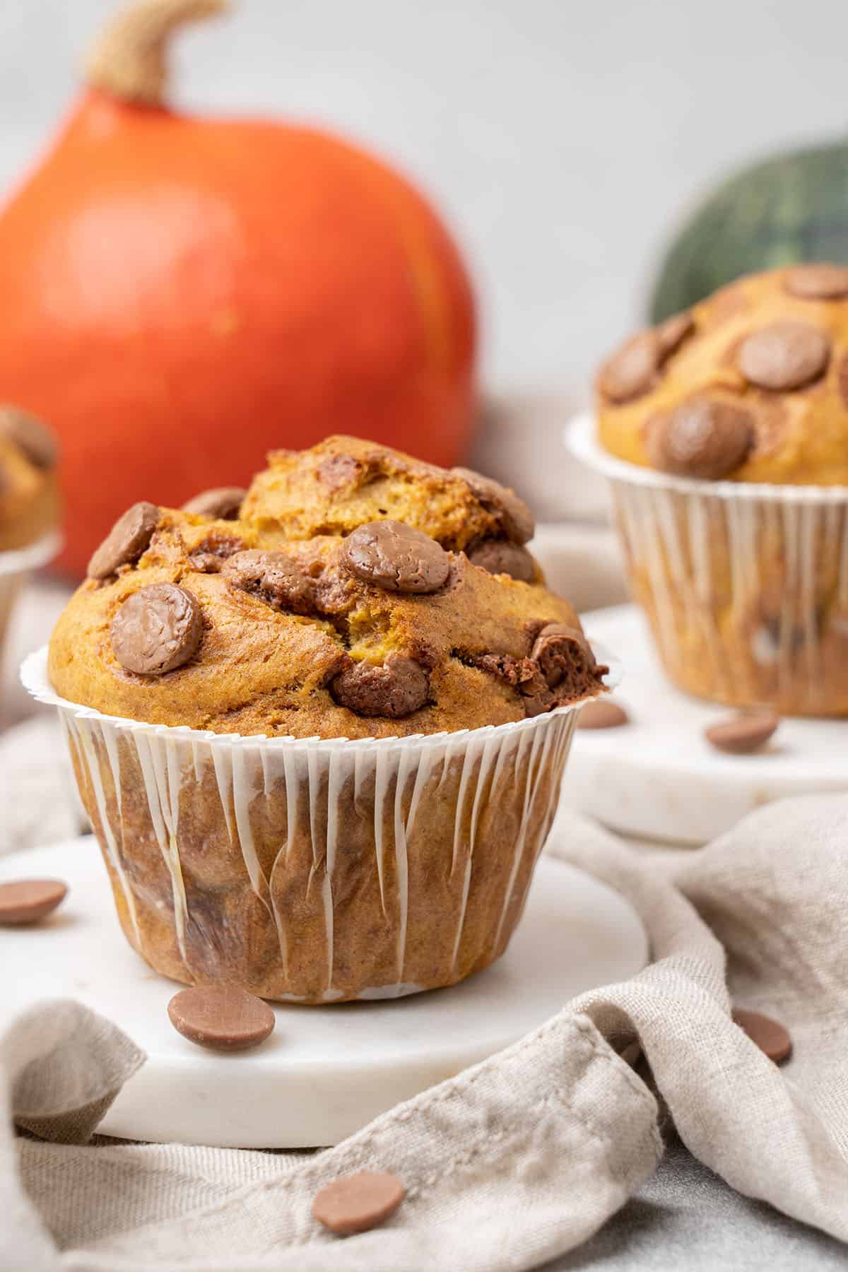 2 Pumpkin banana muffin on a plate.