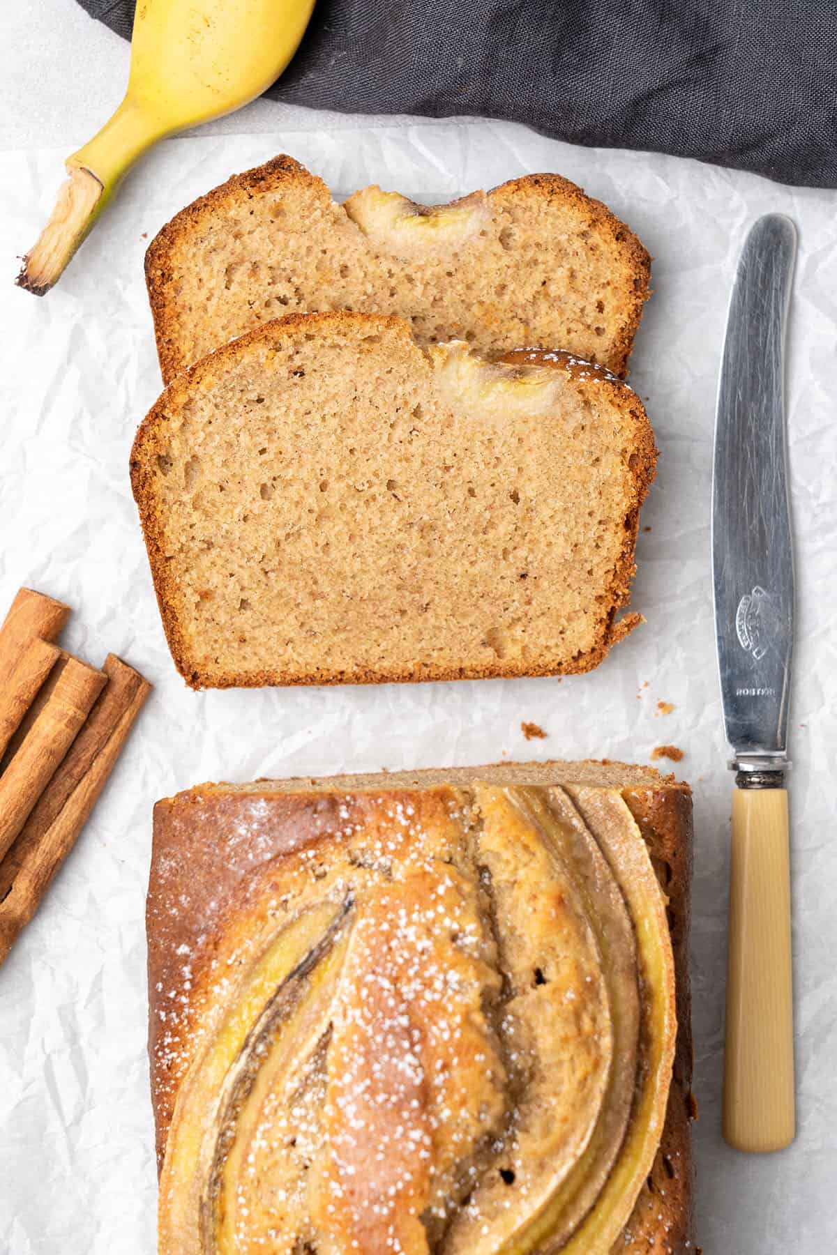 slices of Banana bread on a cooling rack.