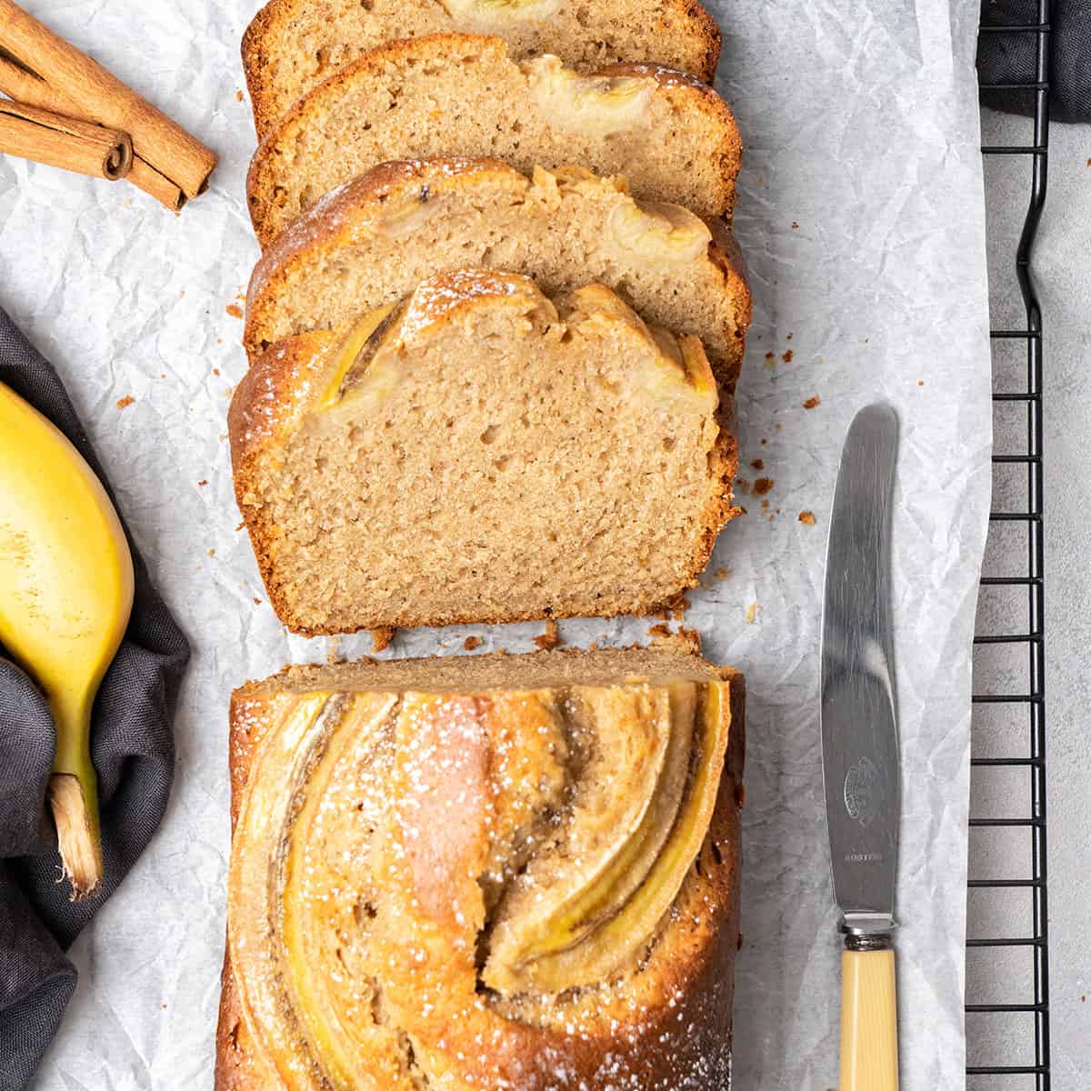 slices of Banana bread on a cooling rack.