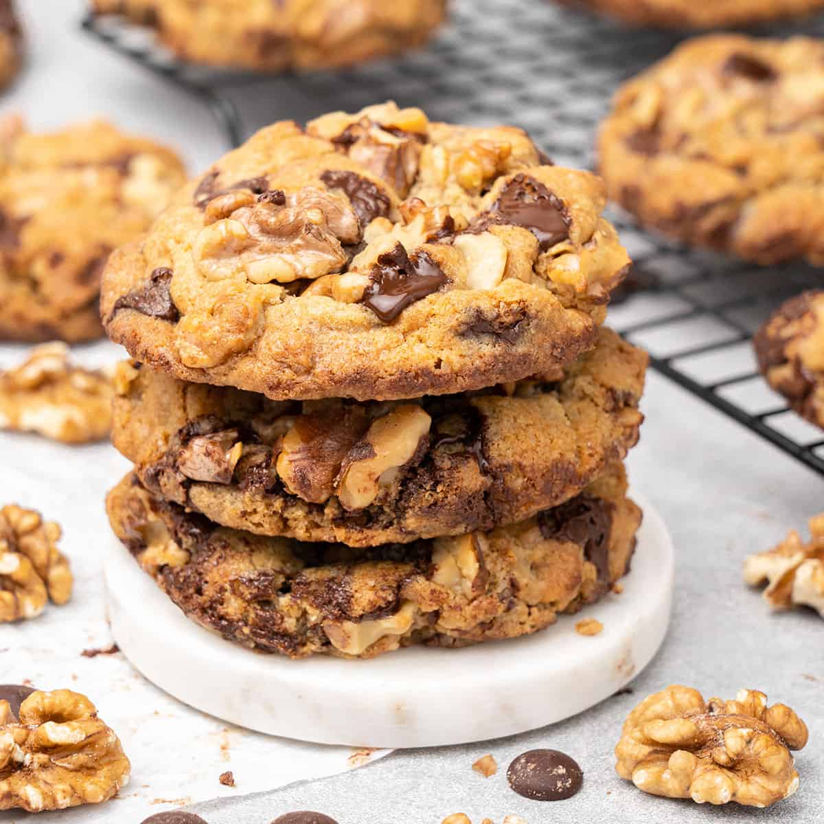 3 Chocolate chip walnut cookies on each other.