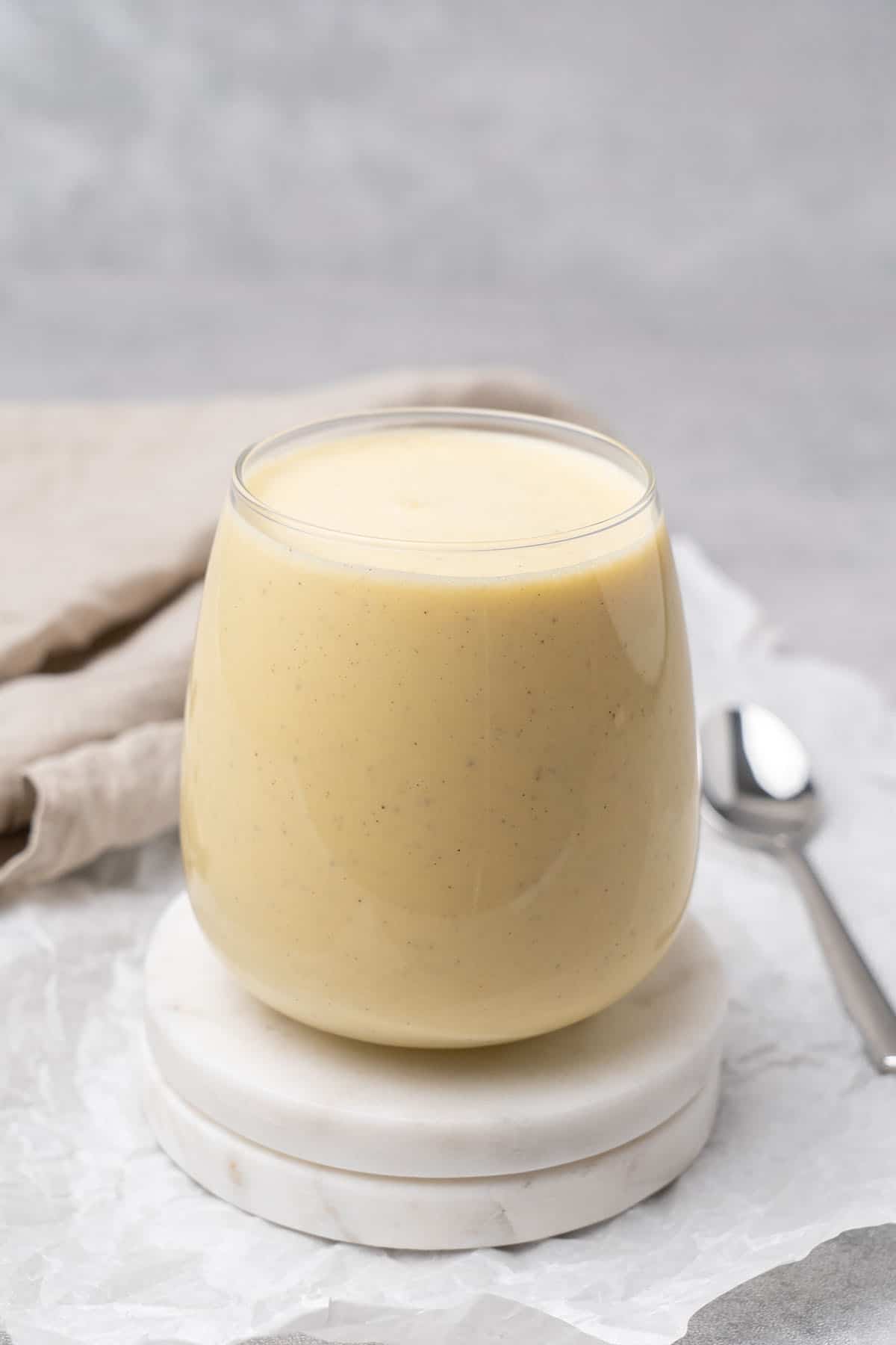 Creme anglaise in a glass.