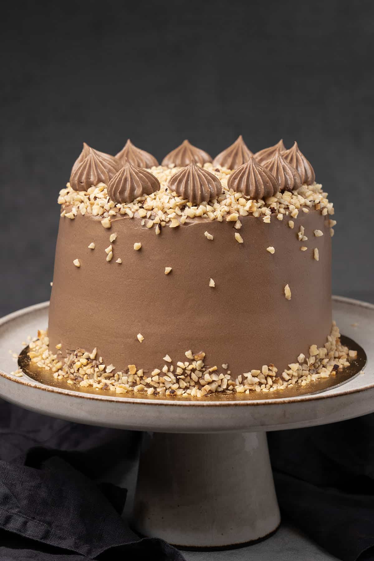 Nutella cake on a cake stand.