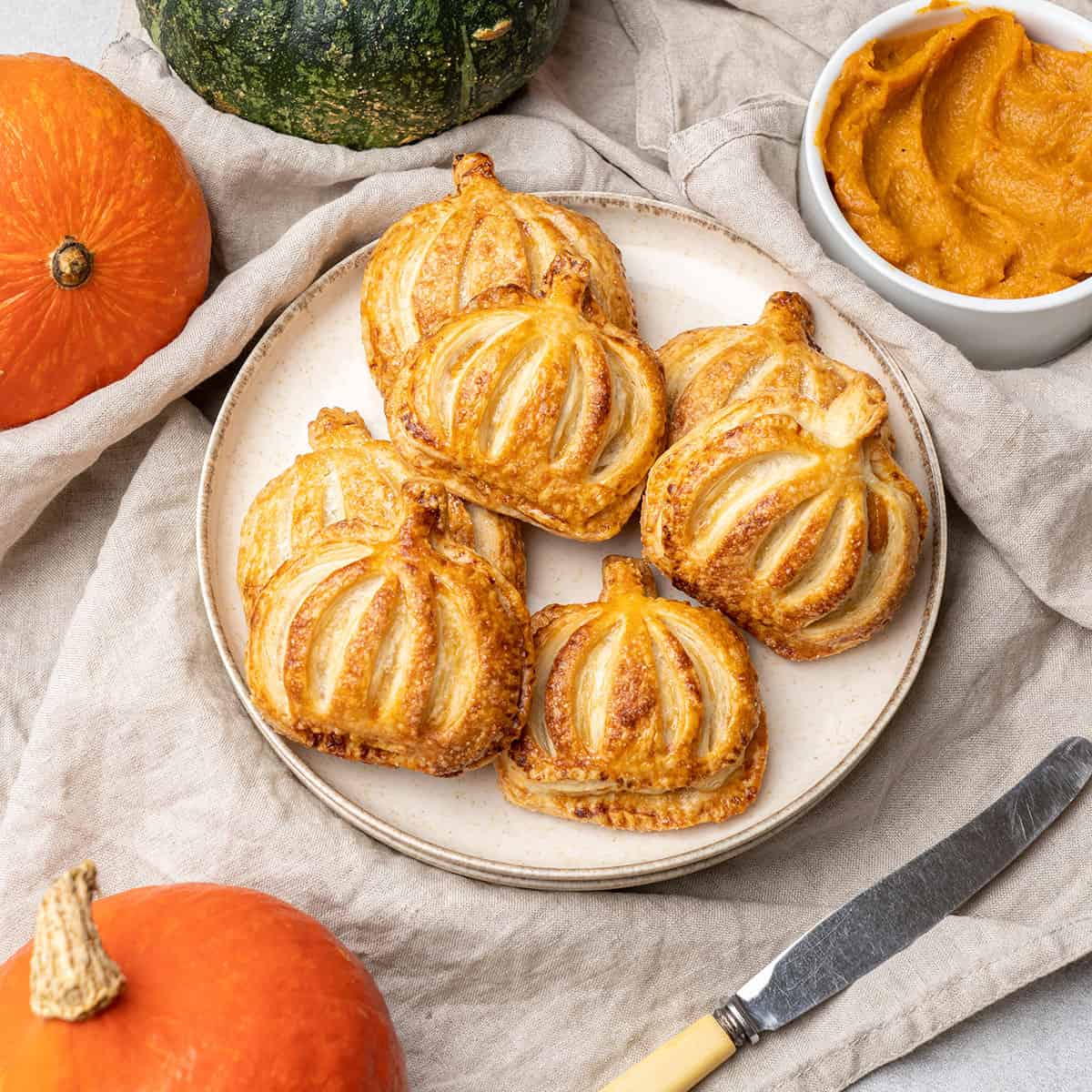 pumpkin handpies on a plate.