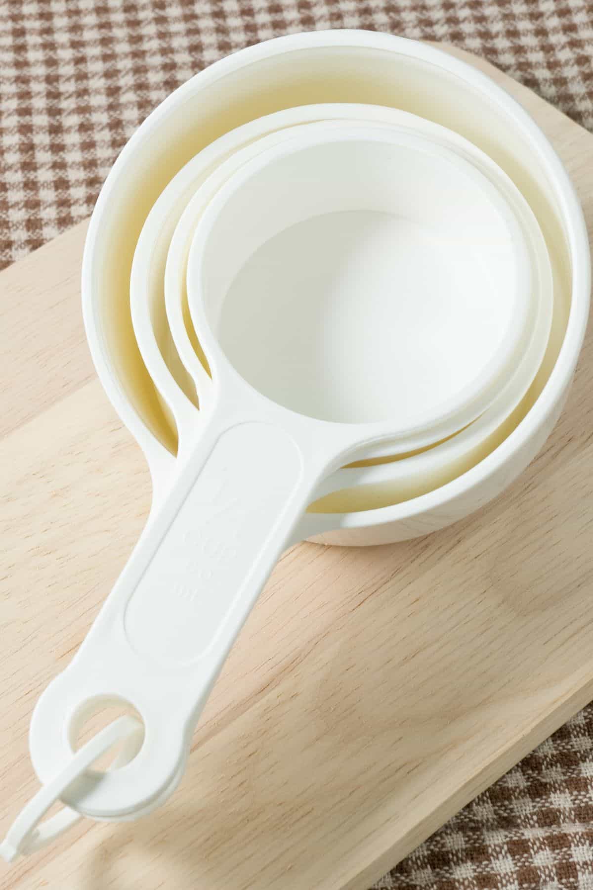 What fraction do the measuring cups represent? 