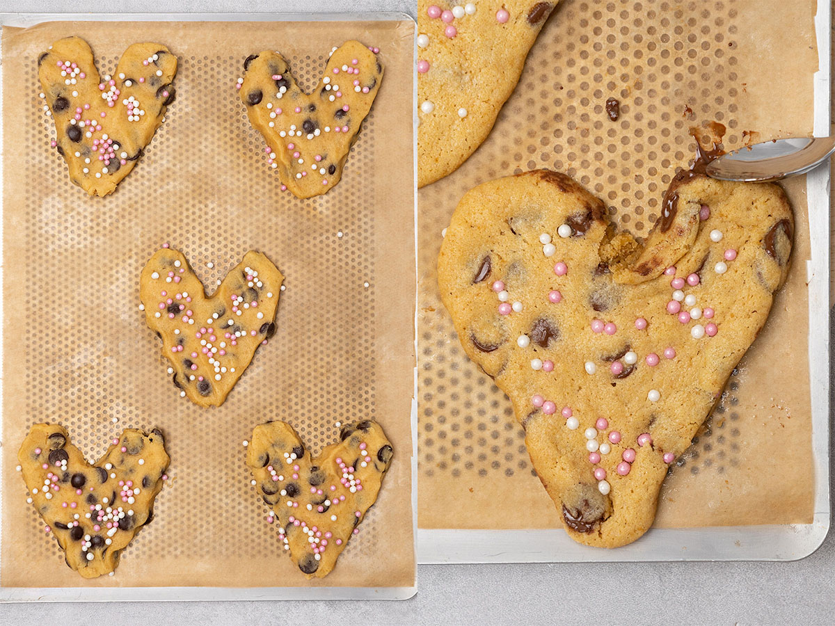 Heart-shaped cookies before baking, and shaping the cookies with a spoon.