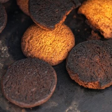 burned cookies on a tray.