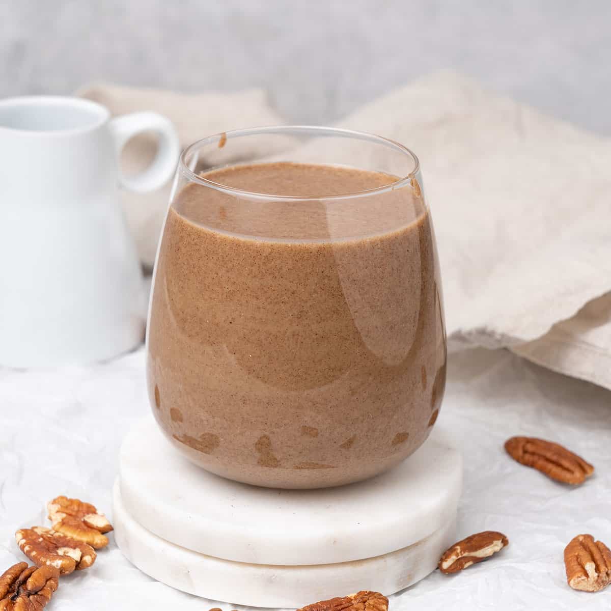 Pecan butter in a glass.