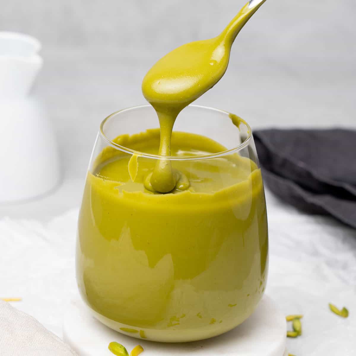 pistachio butter in a glass.