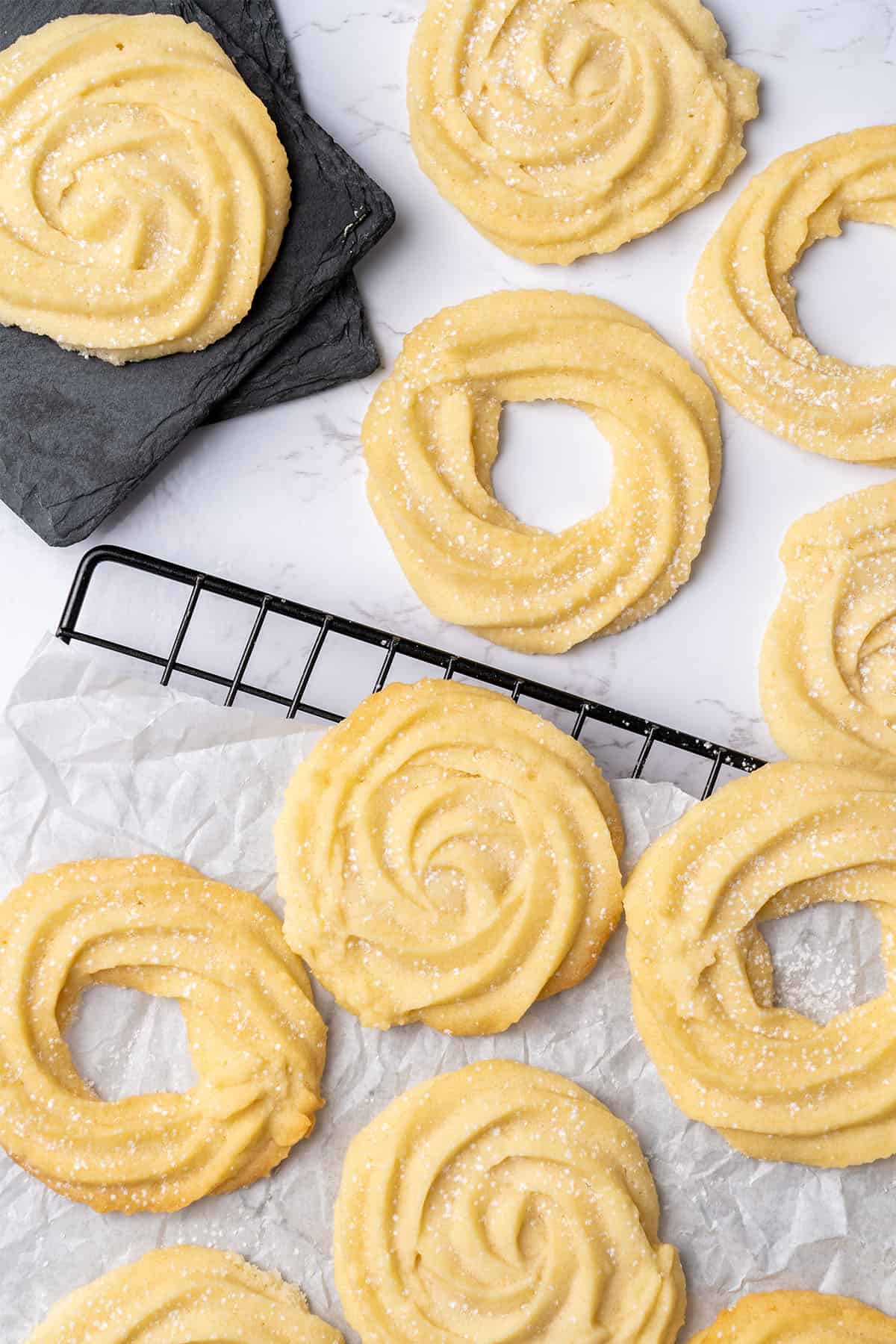 Danish butter cookies on a cooling rack.