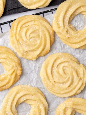 Danish butter cookies on a cooling rack.