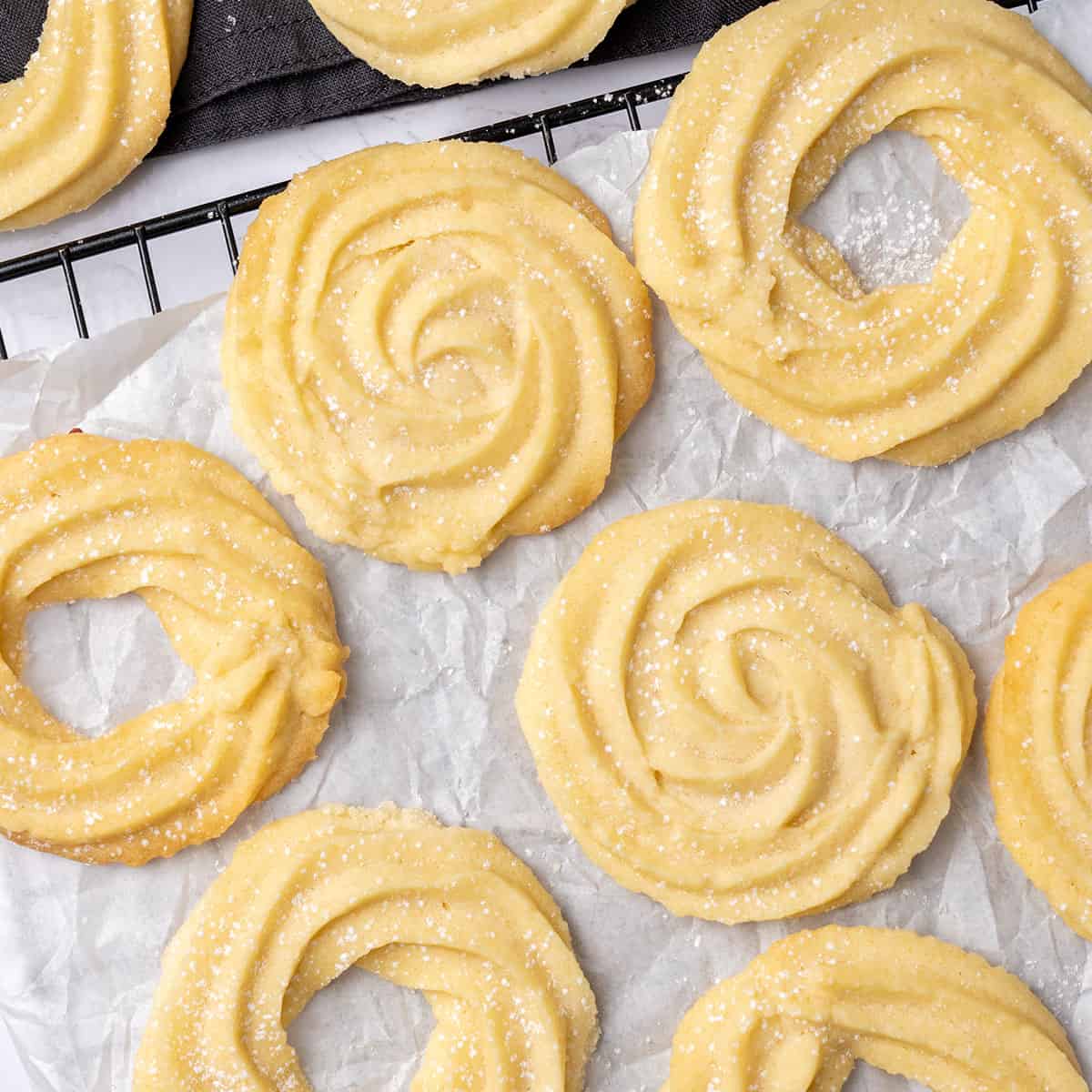 Danish butter cookies on a cooling rack.