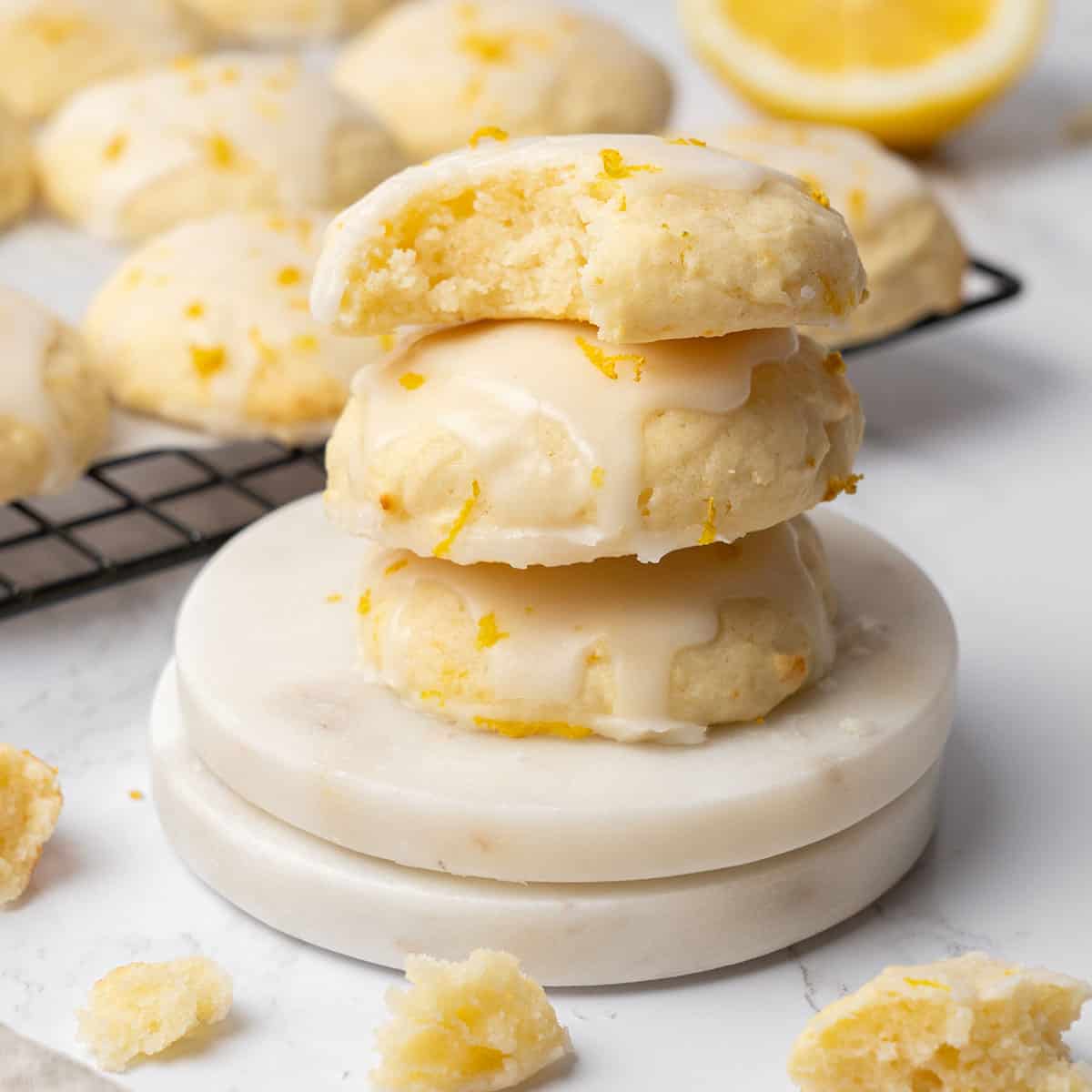 3 Lemon ricotta cookies on top of each.