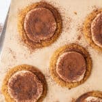 Tiramisu cookies on a baking tray.