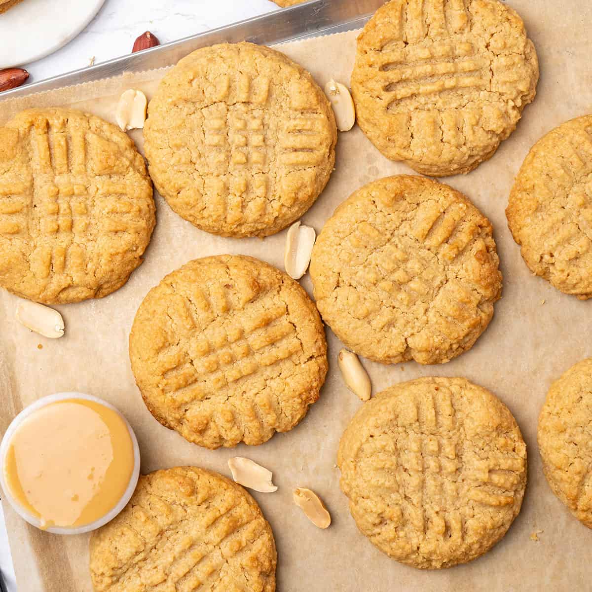 almond flour peanut butter cookies on a baking tray.