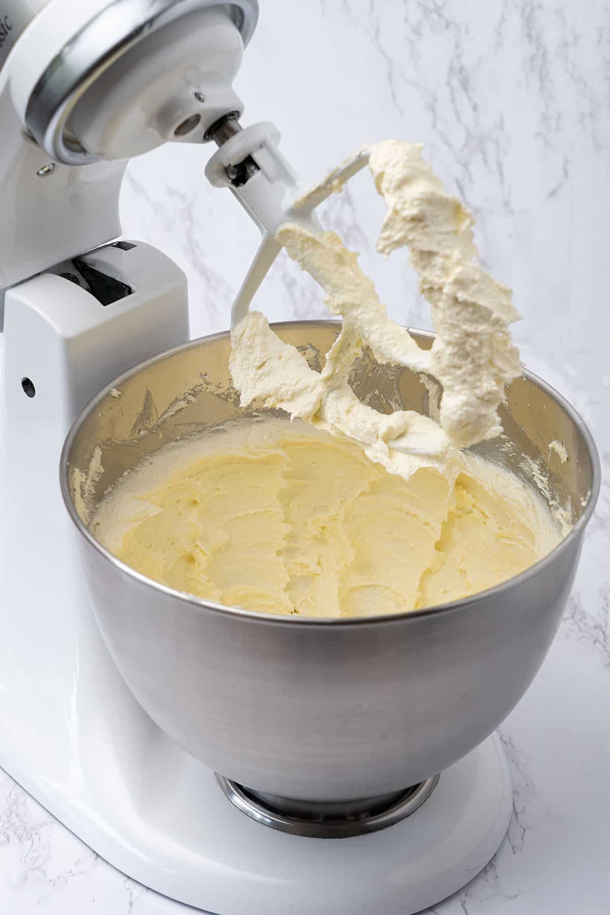 Ready made cream in stand mixer.