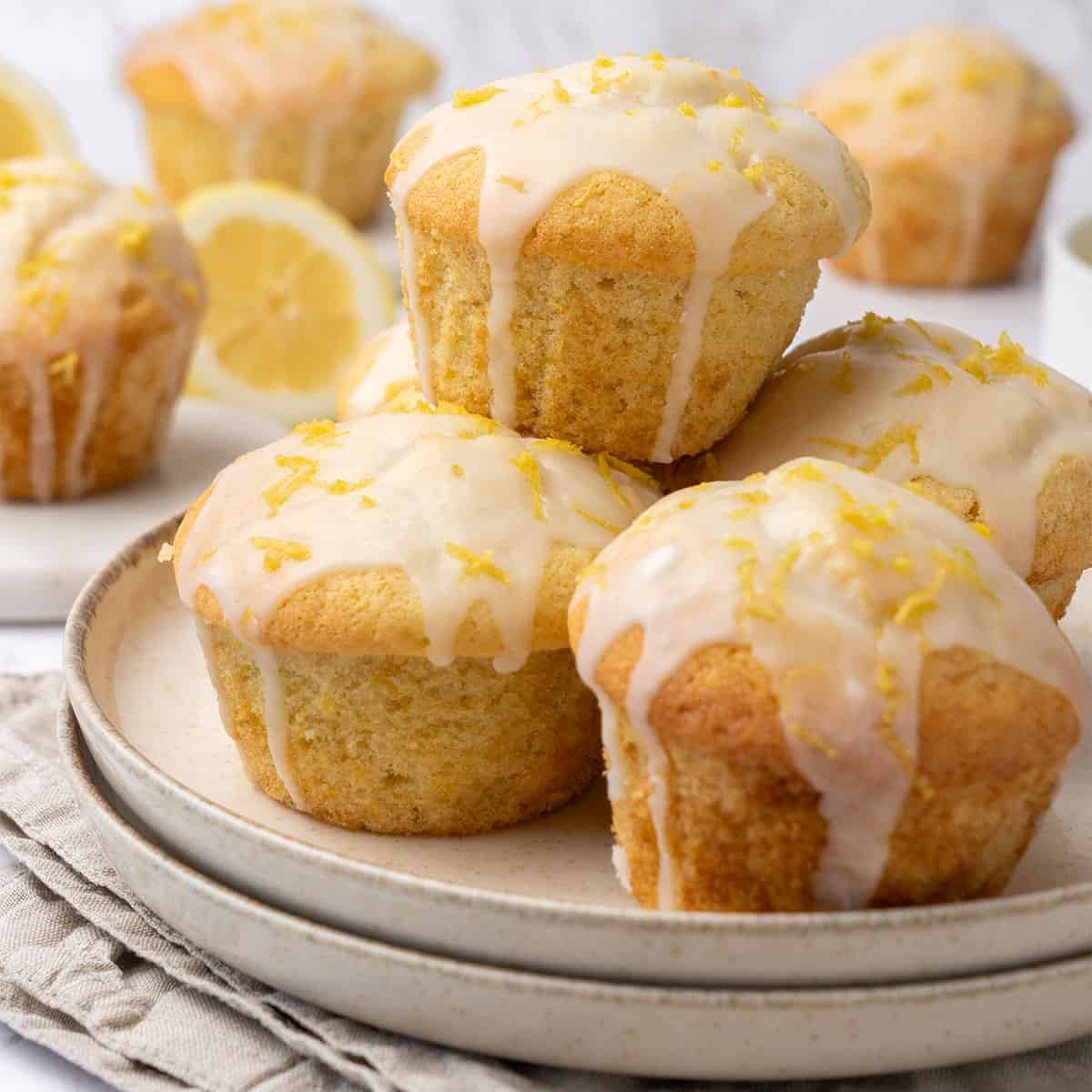 Lemon muffins on a plate.