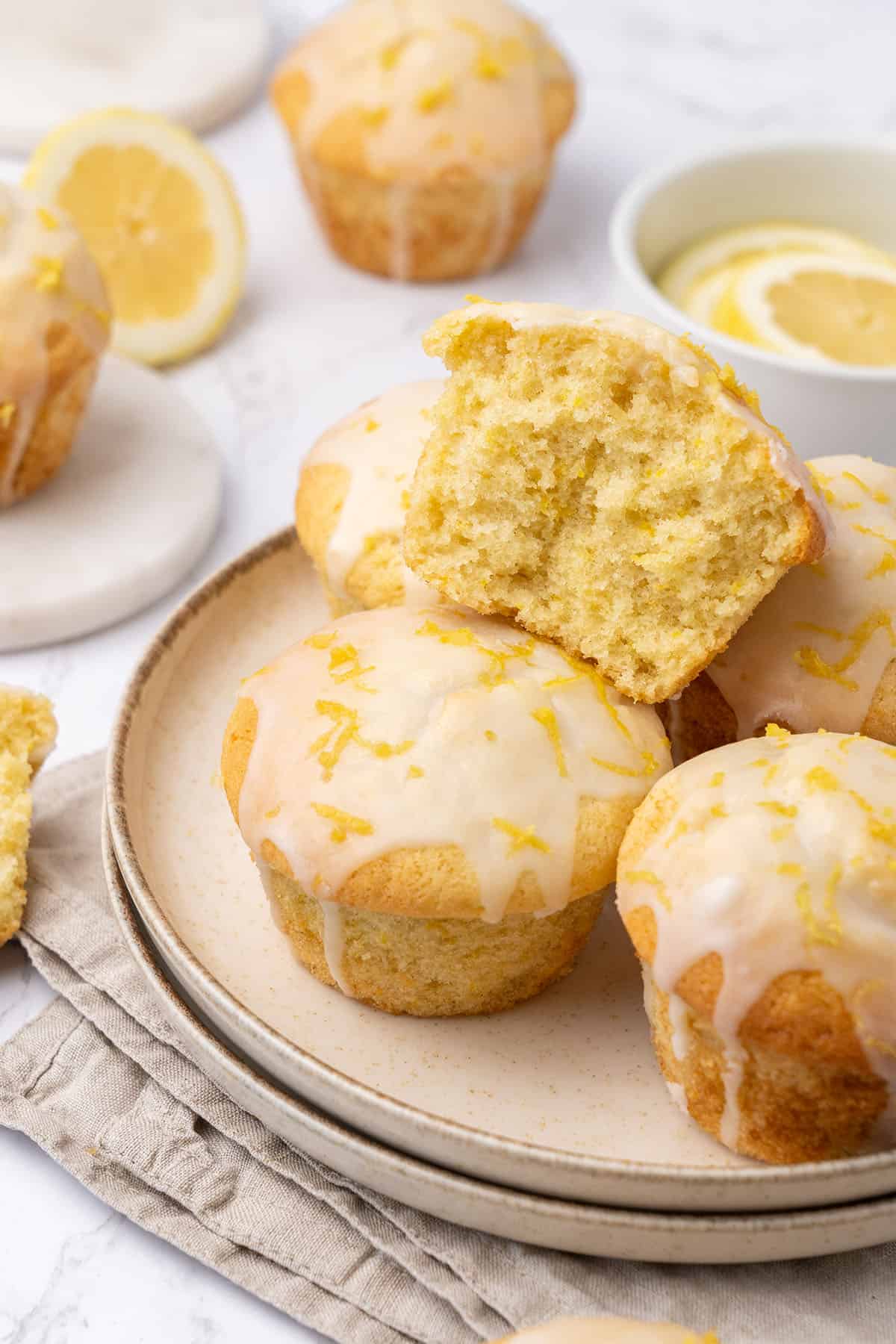 Lemon muffins on a plate.