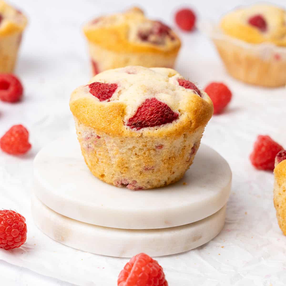 Raspberry Muffin on a plate.