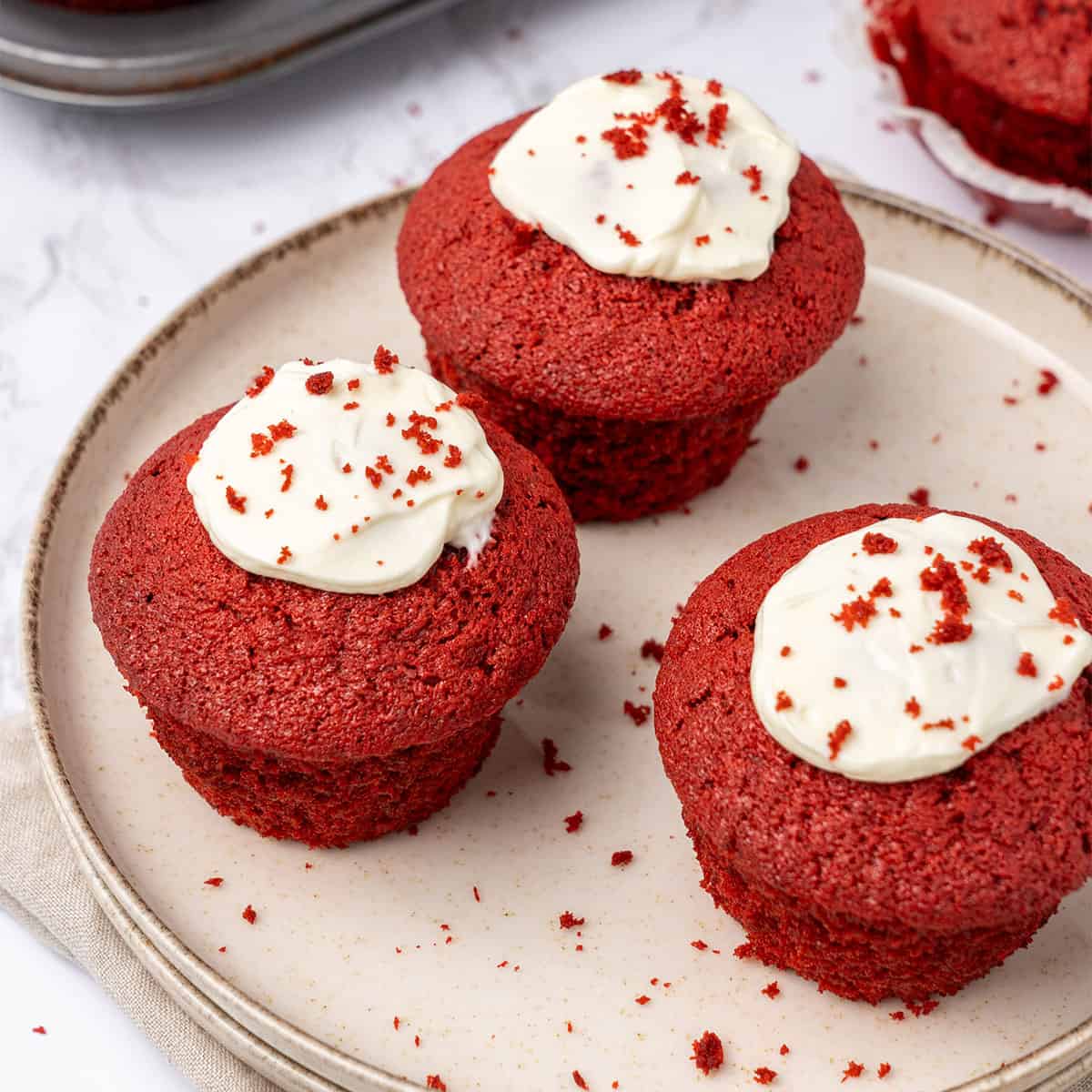 Red Velvet Muffins on a plate.