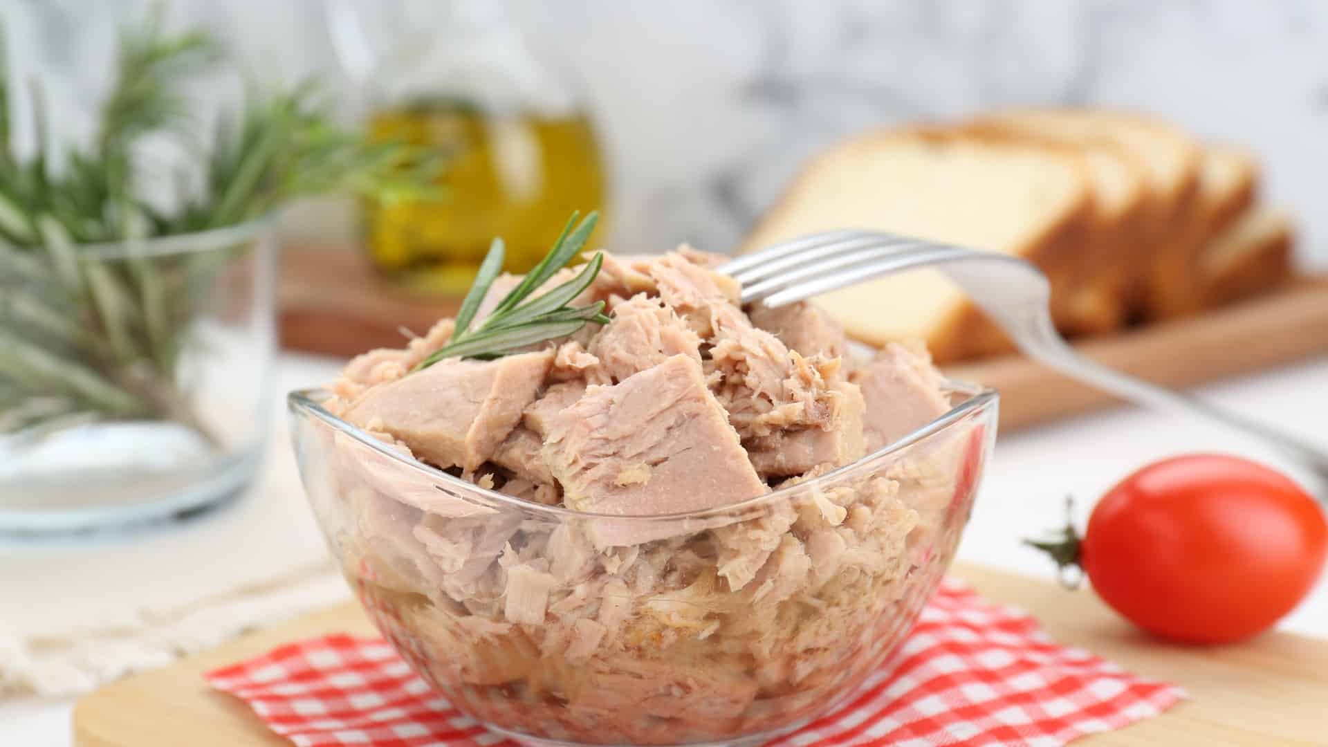 Canned tuna in a clear bowl