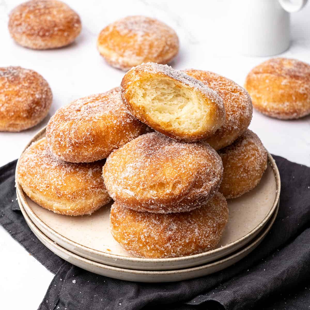 Brioche donuts on a plate.