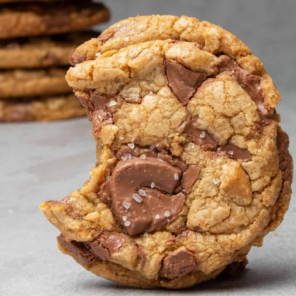 Brown butter chocolate chip cookie with bite