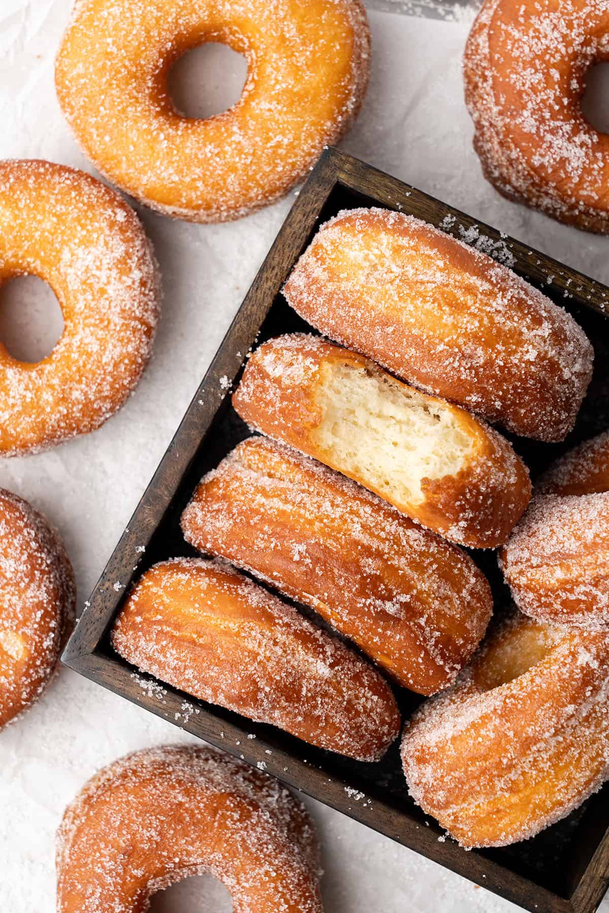 Sugar donuts in a box.