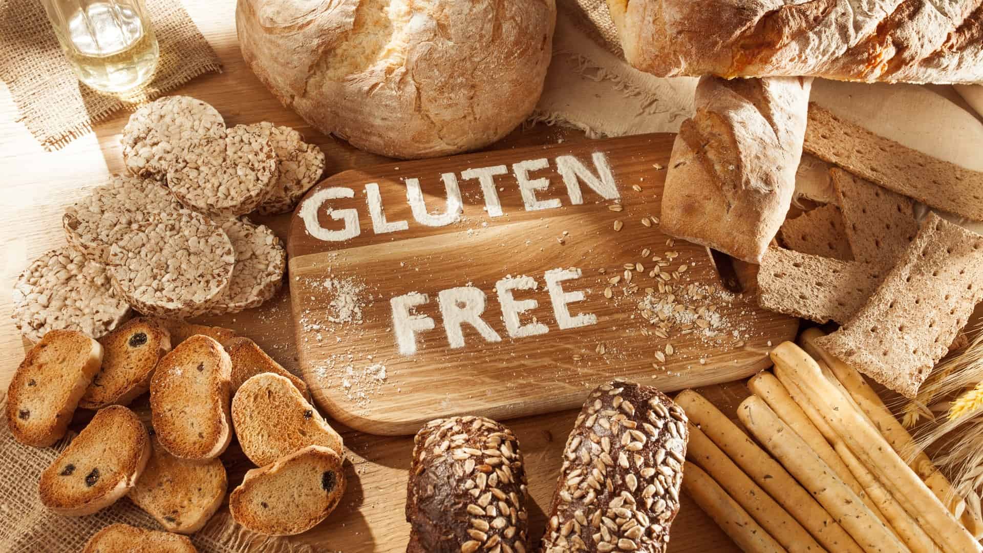 Gluten free board with snacks and bread around