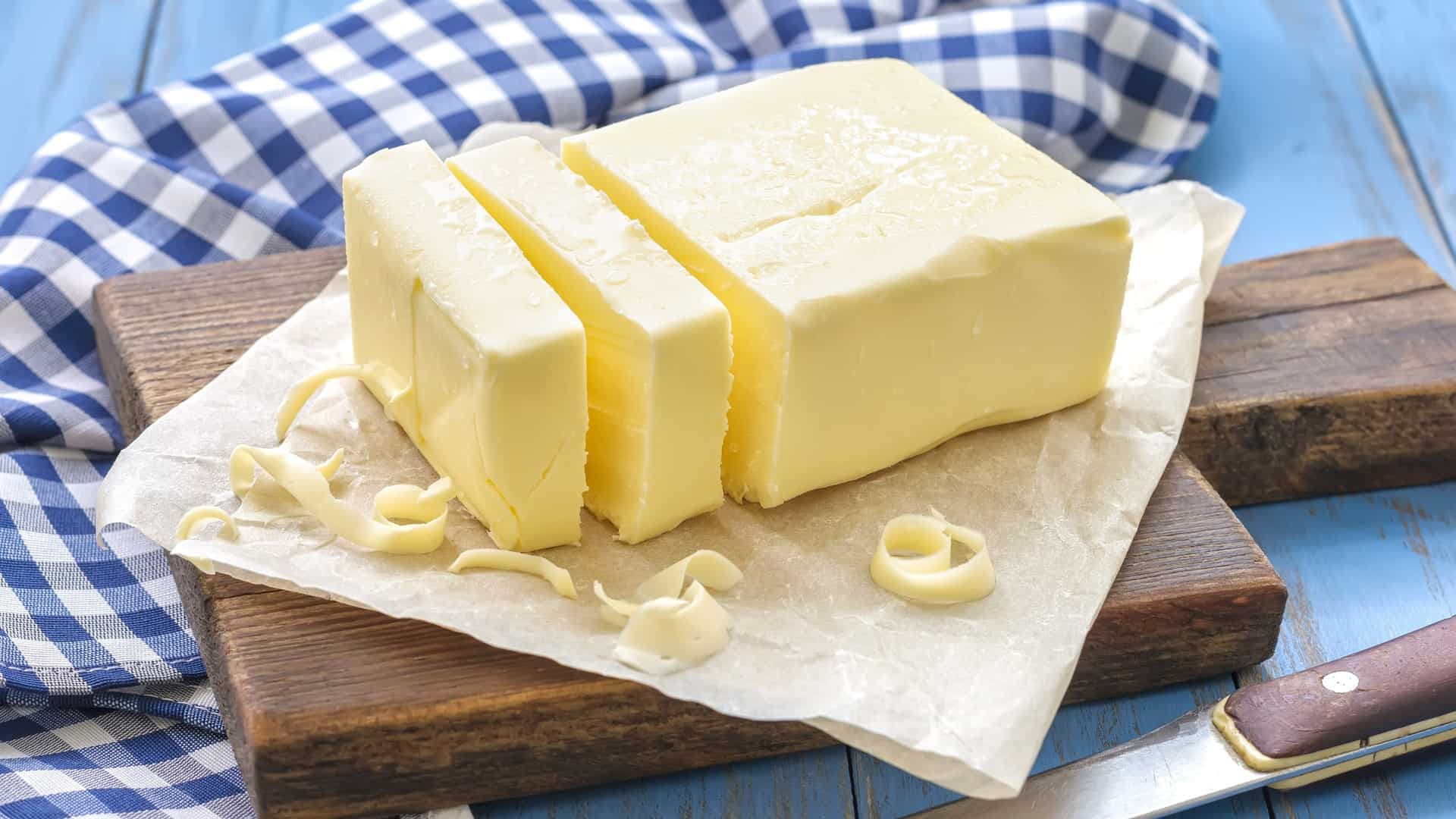 Pound of butter on a blue checkered cloth